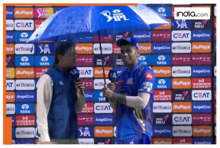 Suryakumar Yadav’s special gesture, holds umbrella for Harsha Bhogle as rain disrupts presentation ceremony